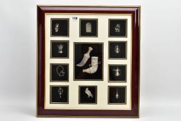 A DISPLAY OF WHITE METAL FIGURINES, large square frame inset with white metal middle eastern