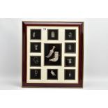 A DISPLAY OF WHITE METAL FIGURINES, large square frame inset with white metal middle eastern