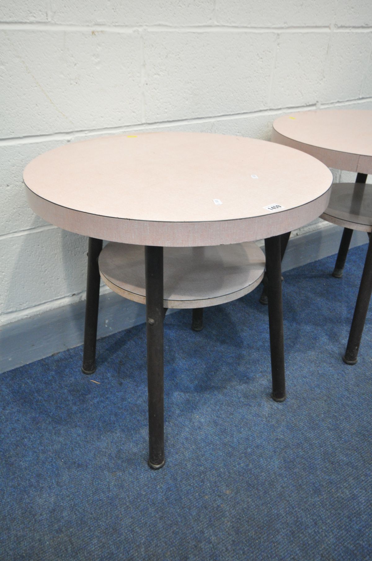 A PAIR OF 1950'S PINK FORMICA PUB TALBE ON TUBULAR LEGS, diameter 61cm x height 60cm - Image 2 of 2