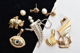 A SMALL QUANTITY OF CHARMS, A PENDANT AND A PAIR OF EARRINGS, three yellow metal charms in forms