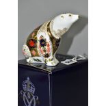 A BOXED ROYAL CROWN DERBY POLAR BEAR PAPERWEIGHT, in Imari pattern, height 10.5cm, length 14.5cm,