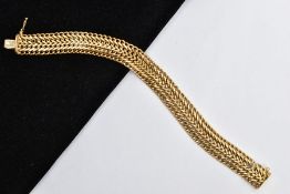 A YELLOW METAL WIDE WHEAT CHAIN BRACELET, approximate width 12.7mm, fitted with an integrated box