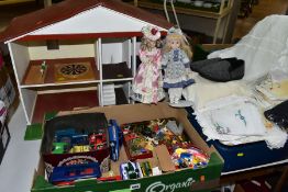 A 1960S/1970S WOODEN DOLLS HOUSE, modelled as a two storey detached house, open fronted with four