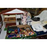 A 1960S/1970S WOODEN DOLLS HOUSE, modelled as a two storey detached house, open fronted with four