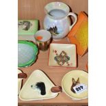 A GROUP OF NOVELTY CARLTON WARE ASHTRAYS, TRINKETS ETC, comprising three 1930s Dogs Head ashtrays,