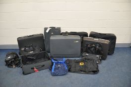 A COLLECTION OF SUITCASES comprising of 11 different suitcases and holdalls all in good used