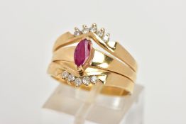 A YELLOW METAL RUBY AND DIAMOND PUZZLE RING, the centre ring designed with a tension set, marquise