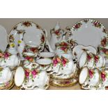 A ROYAL ALBERT OLD COUNTRY ROSES TEA AND COFFEE SERVICE WITH ADDITIONAL ITEMS , comprising a tea