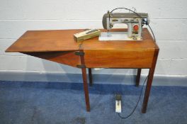 A PINNOCK TEAK TREDLE SEWING MACHINE