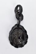A VICTORIAN JET CAMEO PENDANT, a carved right facing profile of a lady, within a pear shape jet