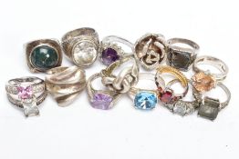 FIFTEEN WHITE METAL RINGS, of various styles and designs, some set with semi-precious stones or