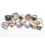 FIFTEEN WHITE METAL RINGS, of various styles and designs, some set with semi-precious stones or