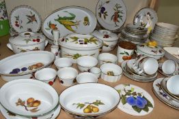 A ROYAL WORCESTER EVESHAM DINNER SERVICE AND COOKWARE, seventy seven pieces comprising six flan