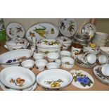 A ROYAL WORCESTER EVESHAM DINNER SERVICE AND COOKWARE, seventy seven pieces comprising six flan