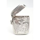 A SILVER VESTA, of a rounded rectangular form, decorated with a floral and foliage design,