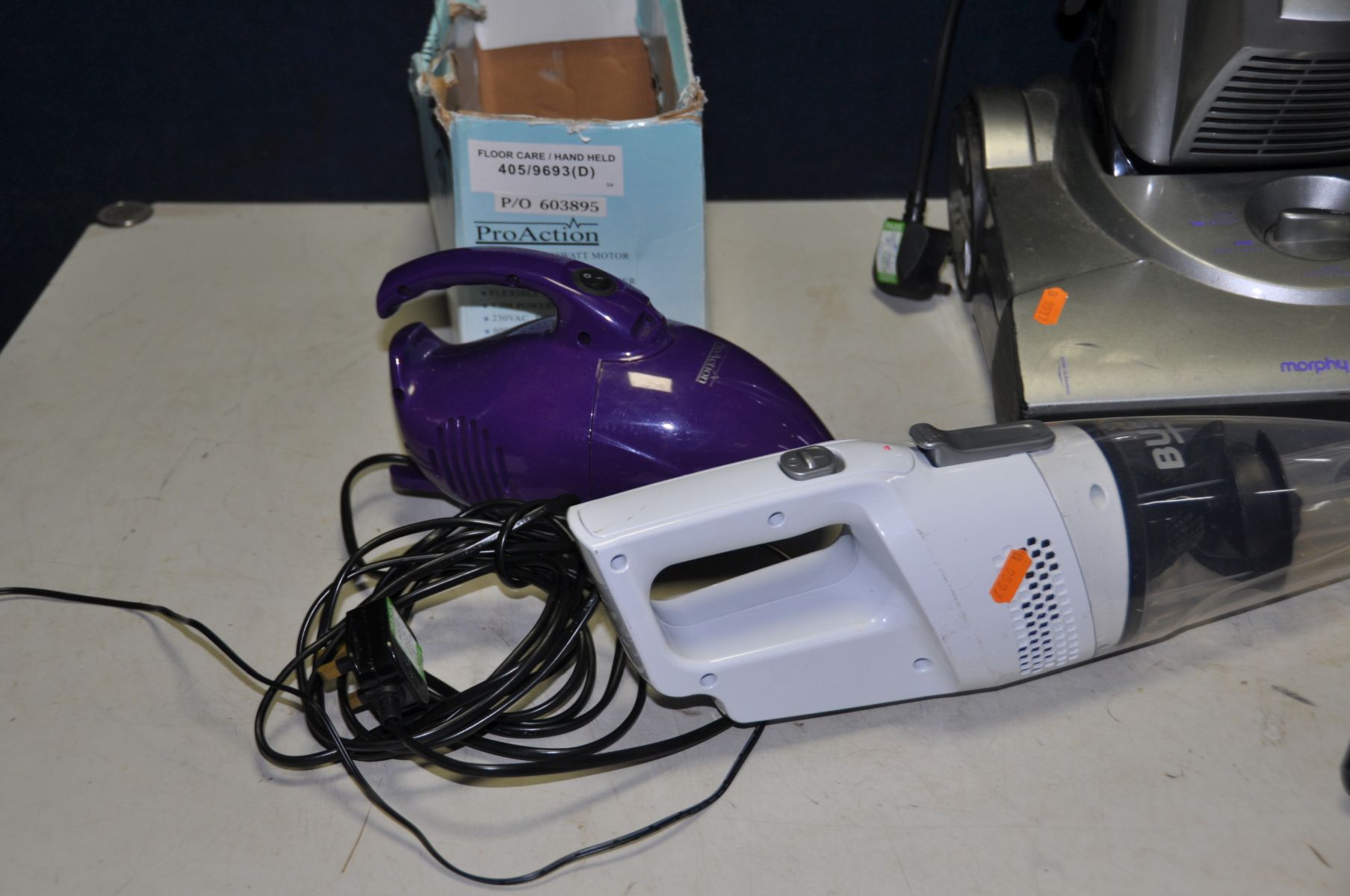 A VAX PULL ALONG VACUUM CLEANER, a Morphy Richards upright vacuum cleaner, a Pro Action hand held - Image 2 of 3