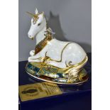 A BOXED ROYAL CROWN DERBY LIMITED EDITION UNICORN PAPERWEIGHT, No 387/2000, to celebrate the new