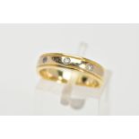 AN 18CT GOLD DIAMOND BAND RING, a yellow gold band with two diamond cut lines to the edges, flush