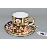 A ROYAL CROWN DERBY IMARI PATTERN COFFEE CAN AND SAUCER, pattern 2451, with red printed and