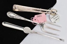 THREE SILVER CUTLERY ITEMS, to include a silver bread fork with floral detailing and vacant