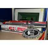 RAILWAY INTEREST: A RAILWAY WAGON PLATE AND THREE MODEL TRAINS, comprising an oval, black painted,