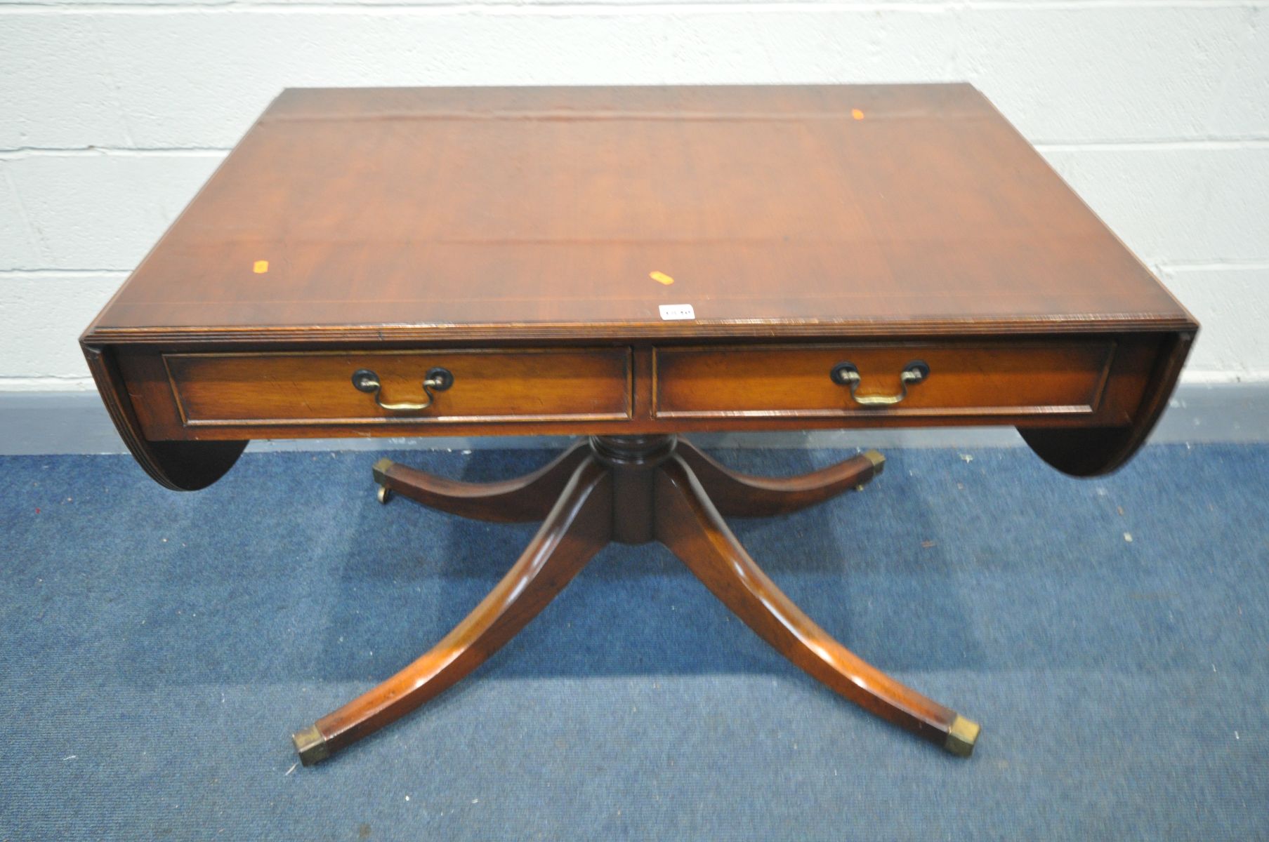 A REPRODUCTION MAHOGANY PEDESTAL SOFA TABLE with two frieze drawers, open length 168cm x closed