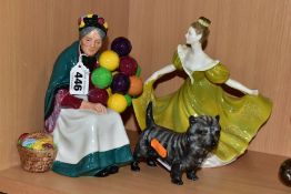 TWO ROYAL DOULTON LADY FIGURES AND A ROYAL DOULTON DOG, comprising 'The Old Balloon Seller'