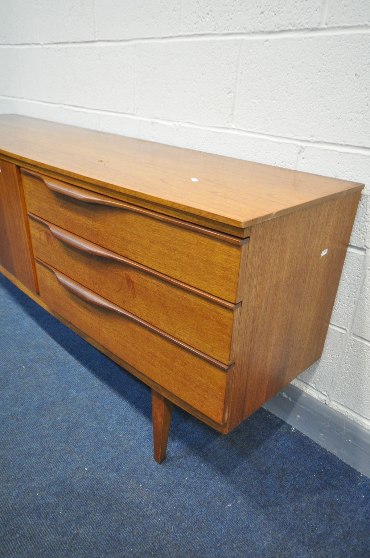 A MID CENTURY BEAUTILITY TEAK SIDEBOARD, with double cupboard doors, besides three drawers, - Image 3 of 3