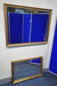 TWO SIZED MATCHING GILT FRAMED BEVELLED EDGE WALL MIRRORS, width 110cm x 85cm