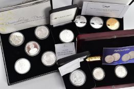 A QUANTITY OF COINS AND COMMEMORATIVES, to include a cased two-coin silver rupees 1901 and 1918, a