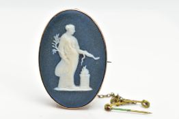 A WEDGWOOD CAMEO BROOCH, navy and white cameo signed to the base 'Wedgwood', within a collet