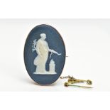 A WEDGWOOD CAMEO BROOCH, navy and white cameo signed to the base 'Wedgwood', within a collet