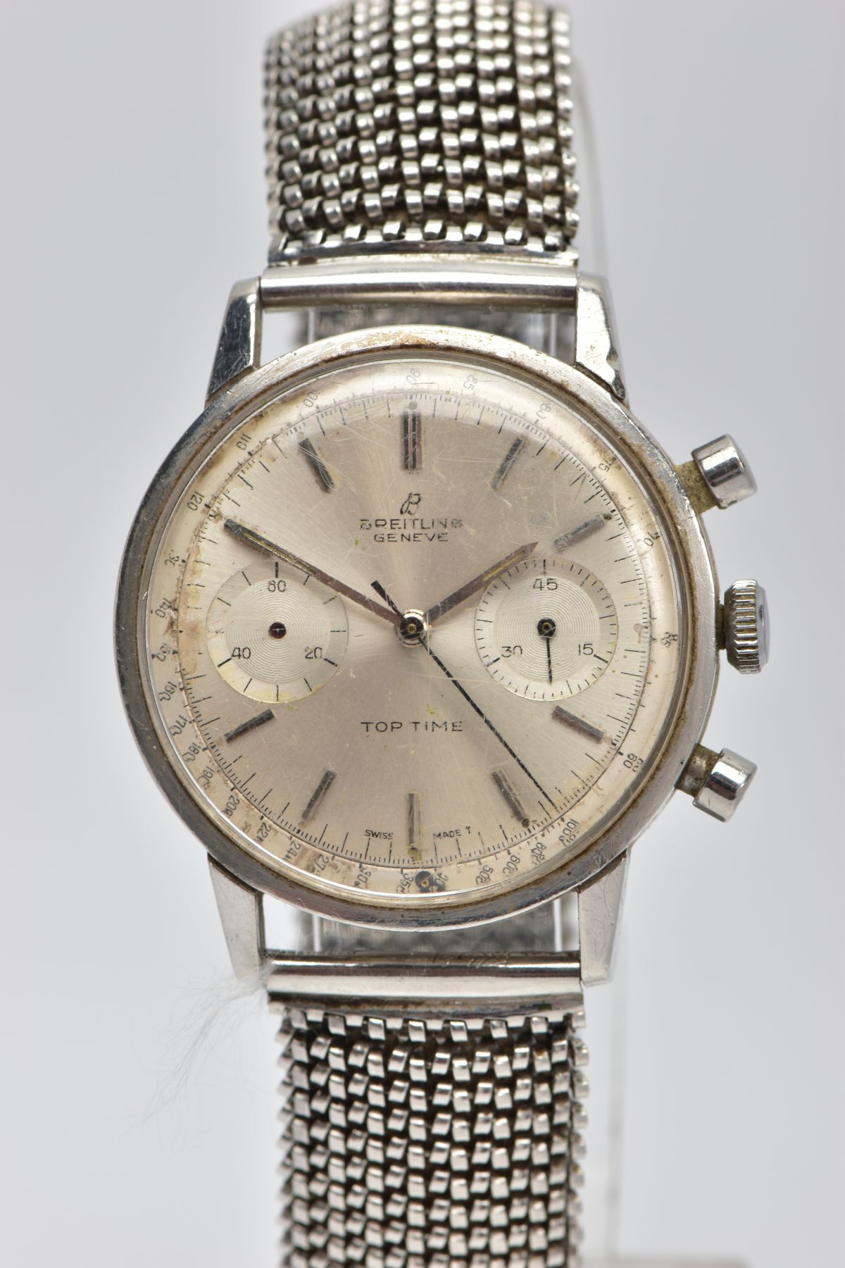A 'BREITLING GENEVE, TOP TIME' WRISTWATCH, hand wound movement, round silver dial signed 'Breitling,