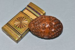 A CARVED COQUILLA NUT BOX AND A STRAW WORK VESTA CASE, comprising carved Coquilla nut thimble or