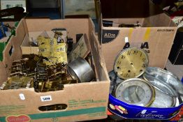 TWO BOXES AND A TIN OF CLOCK MOVEMENTS AND PARTS, to include twelve clock movements, dials,