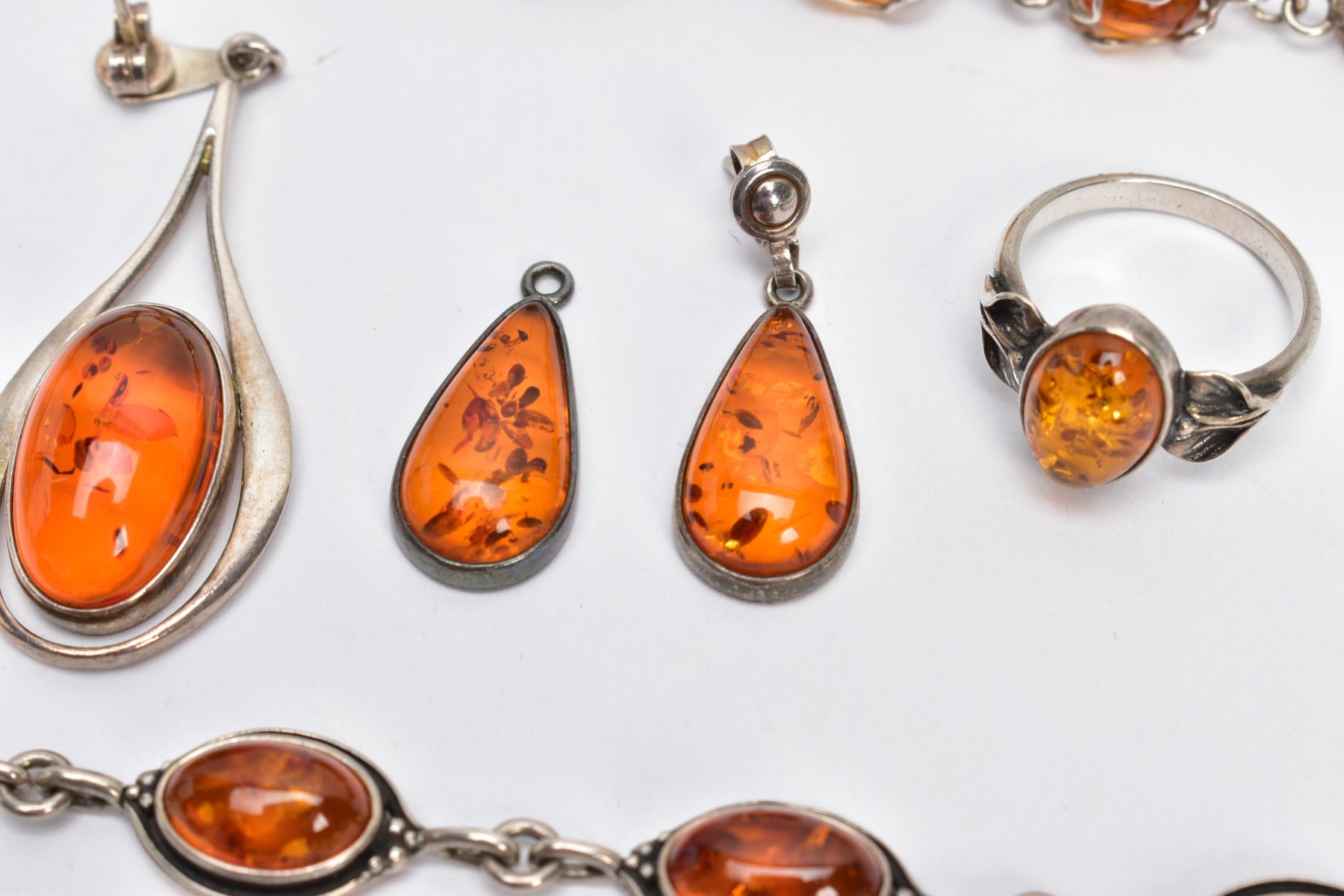 A SELECTION OF AMBER SET JEWELLERY, to include two white metal bracelets set with amber cabochons, - Image 3 of 6