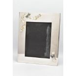 A LARGE SILVER-PLATED PHOTO FRAME, of a rectangular form plain polished design with applied