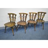 A SET OF FOUR ERCOL PRINCE OF WALES FEATHER BACK CHAIRS