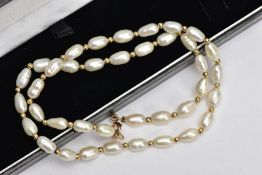 A CULTURED FRESHWATER PEARL NECKLACE, thirty-eight baroque fresh water pearls interspaced between