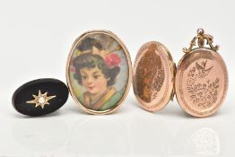 A LOCKET AND TWO OTHER ITEMS, to include an oval locket with floral and bird detail, fitted with a