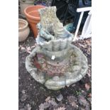 A COMPOSITE WATER FEATURE, formed of two shell shaped tiers, height 73cm (condition:-some chips, top