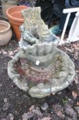 A COMPOSITE WATER FEATURE, formed of two shell shaped tiers, height 73cm (condition:-some chips, top