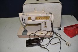 A VINTAGE SINGER 411G SEWING MACHINE with case and treadle/ power cable (PAT fail due to uninsulated