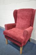 A BEECH WING BACK ARMCHAIR