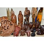 TWENTY ONE WOODEN ETHNIC AND TRIBAL FIGURAL CARVINGS AND FACE MASKS, ETC, to include a Boma Canada