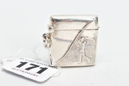 A SILVER VESTA CASE, detailing a person playing golf on each side, approximate length 33mm,