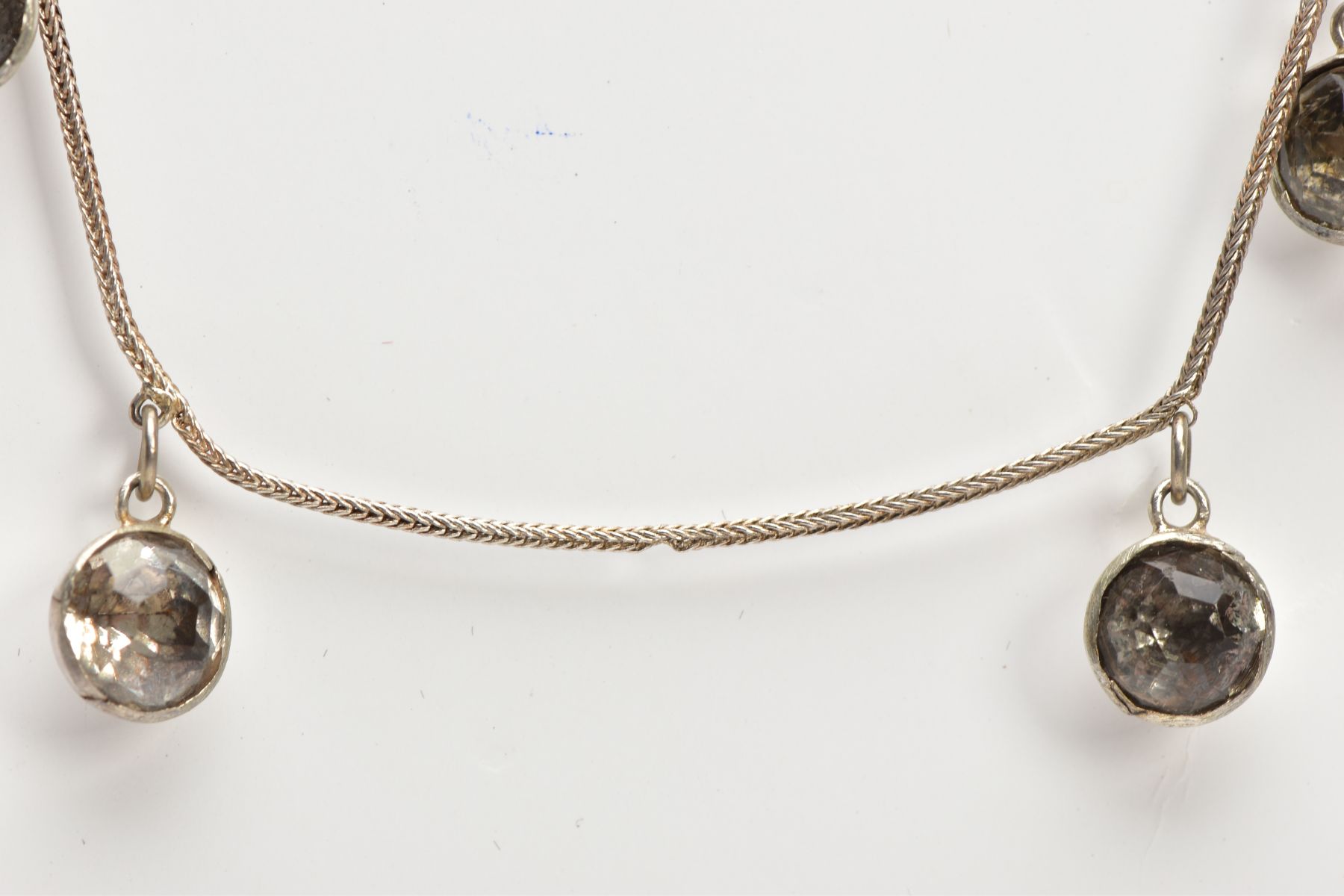 A WHITE METAL AND PASTE NECKLACE, designed as ten old cut paste stones each in a bezel domed back - Image 6 of 7