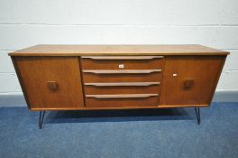 A MID CENTURY TEAK SIDEBOARD with two cupboard doors flanking four drawers on later metal hairpin