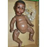 AN ARMAND MARSEILLE BLACK DREAM BABY DOLL bisque head with closed mouth, marked AM 341/8K, composite