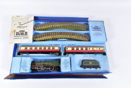 A BOXED HORNBY DUBLO DUCHESS OF MONTROSE PASSENGER TRAIN SET, No.EDP12, comprising said locomotive